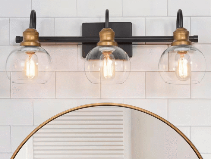 22.5 in. 3-Light Modern Aged Brass and Black Bathroom Vanity Light with Clear Glass Globe Shades Bathroom Sconce